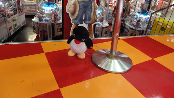 a pingu plush at the entrance
